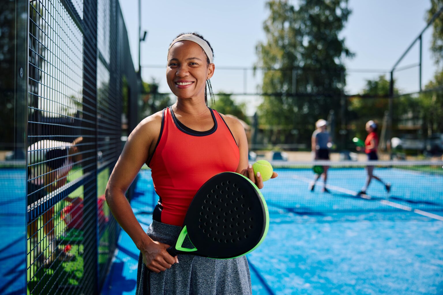 happy-black-athletic-woman-playing-paddle-tennis-a-2023-07-11-07-35-45-utc-min